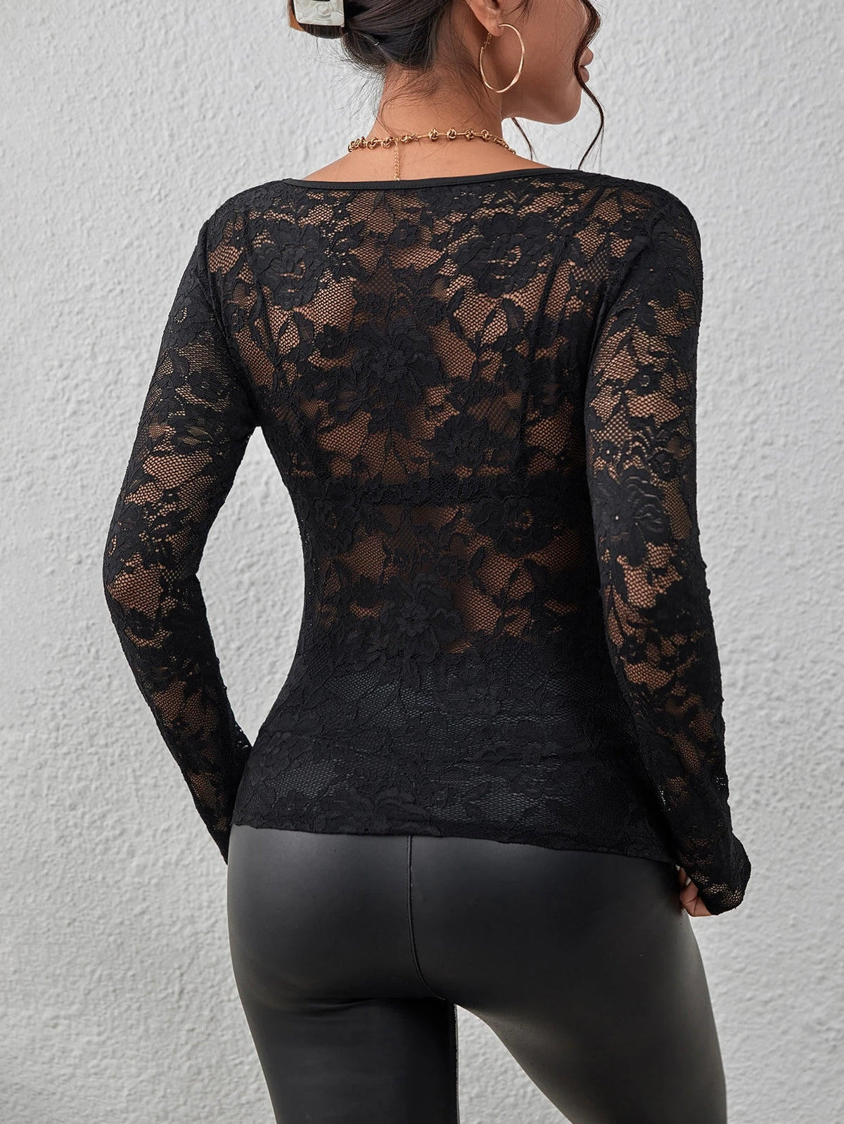 Top de Encaje Floral con Ribete